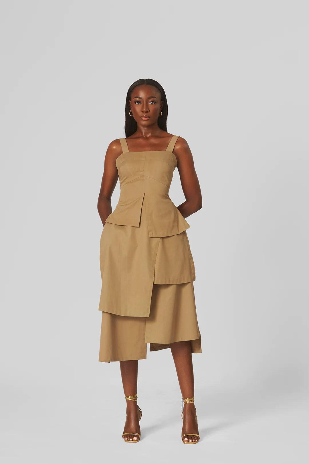 M.O.T Gola Set, Fitted sleeveless top with asymmetrical hemline & Multilayer midi skirt leather skirt refined